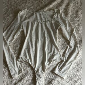 Elegant White Long Sleeve Bodysuit